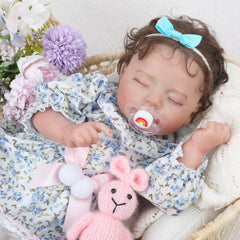 KSBD lifelike reborn baby doll girl in green dress for imaginative play.