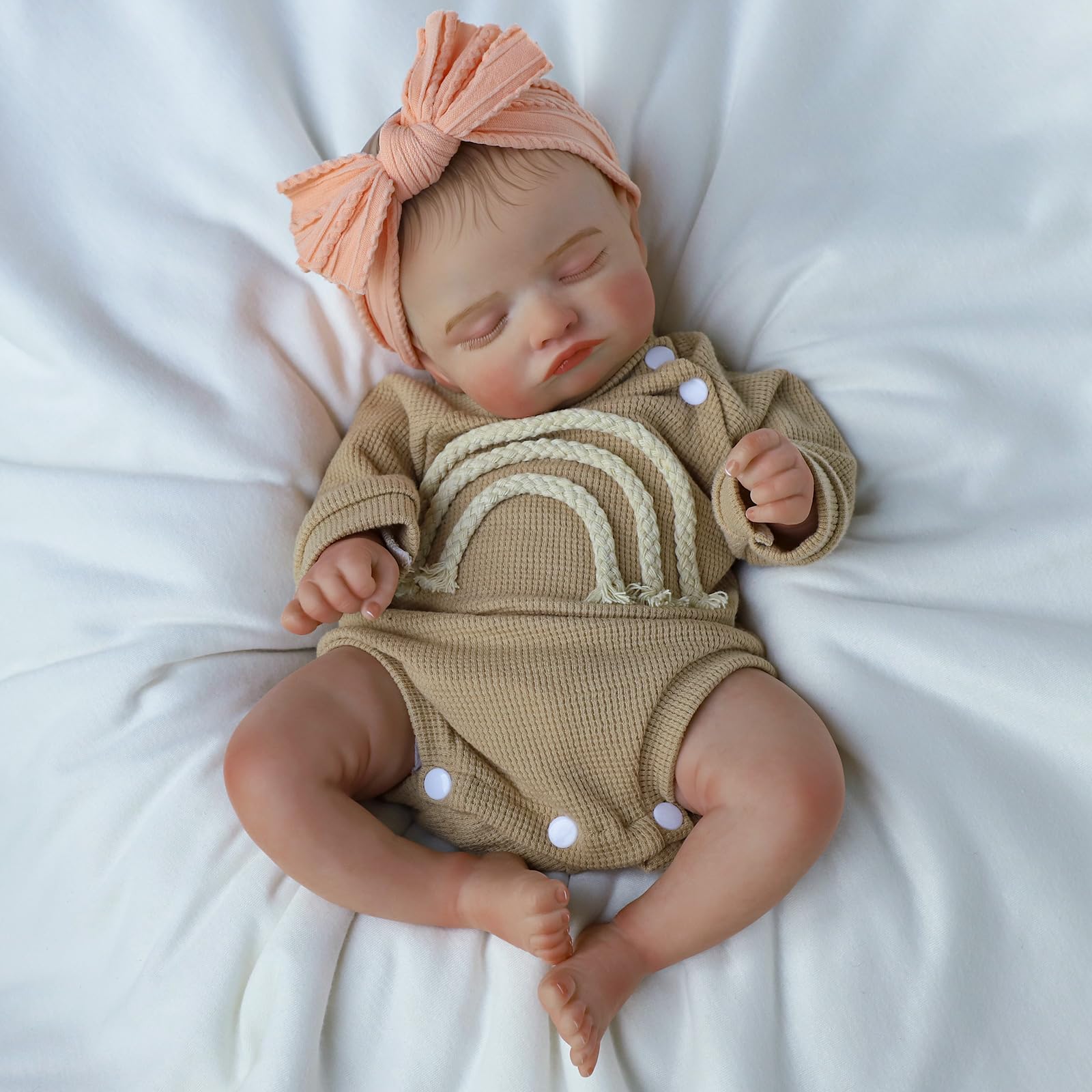 KSBD Lifelike Reborn Baby Doll with nursing bottle for nurturing play.