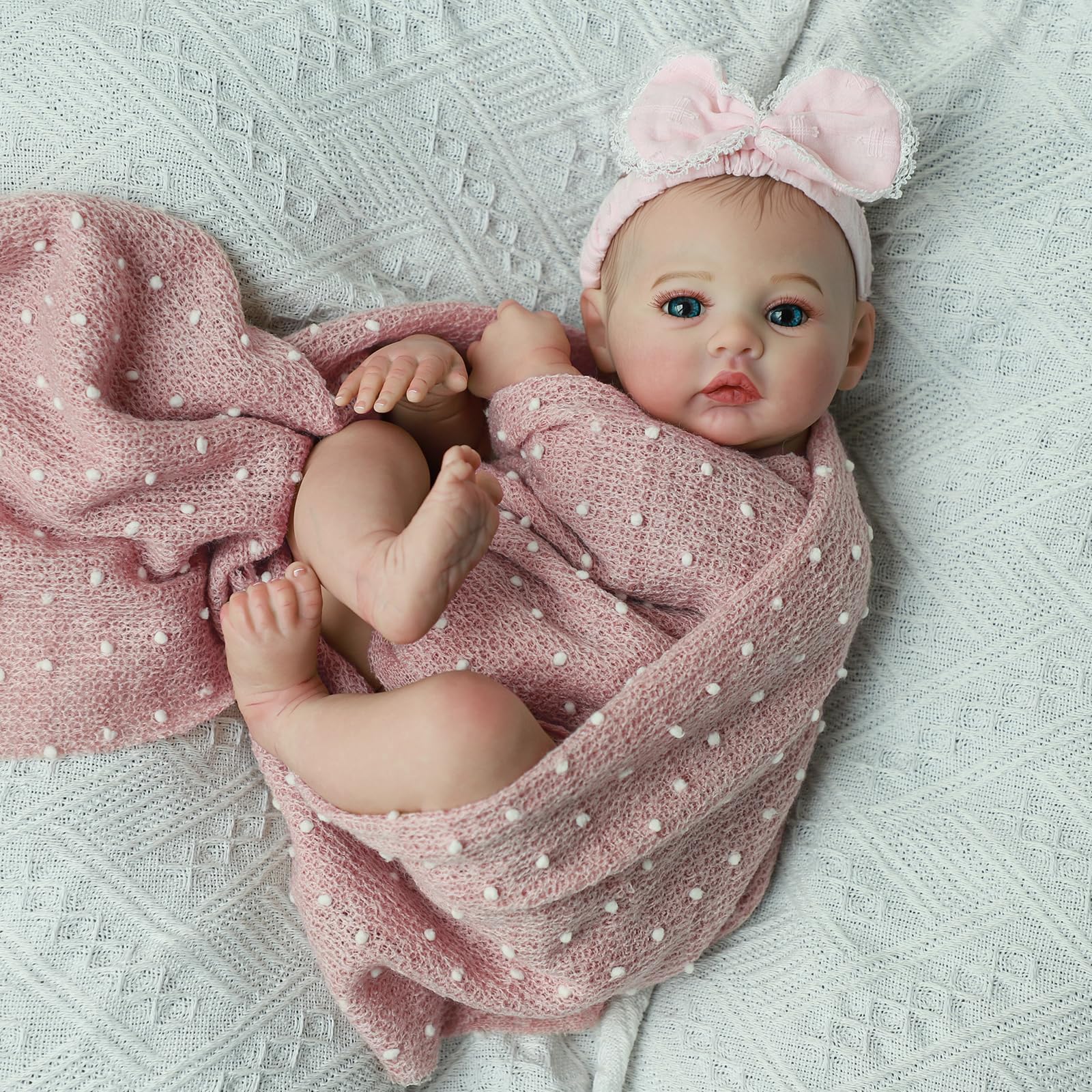 KSBD Poseable limbs enable realistic seating and cradle poses for play.
