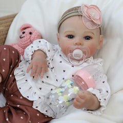 KSBD Reborn doll featuring interchangeable outfits for endless creative styling and pretend dressing.