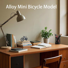 Kuasting blue die-cast bike cake topper ready for celebration decor