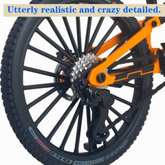 Kuasting yellow bike miniature with turning handlebars for display.