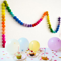 KUQJJQU rainbow felt ball banner decorates wall with vibrant kid-friendly charm