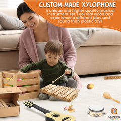 L Learning Toy Boxes wooden maracas invite upbeat rhythm and shared playtime