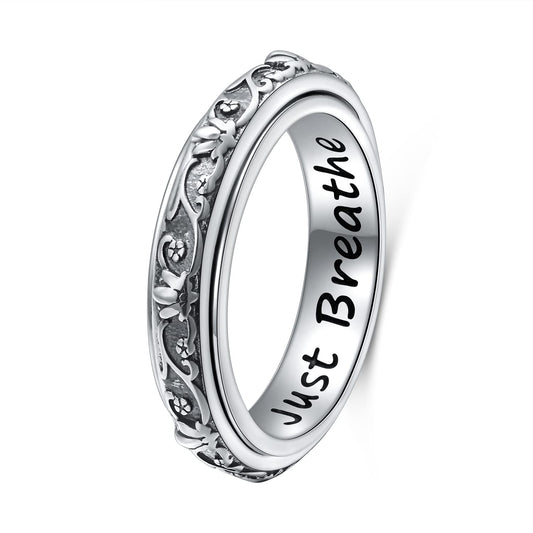 Ladytree spinner ring featuring lotus and Just Breathe for discreet stress distraction.