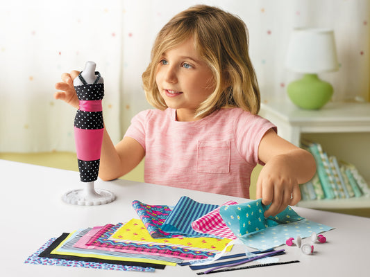 Lakeshore My First Fashion Designer fabric sheets enable quick styling.