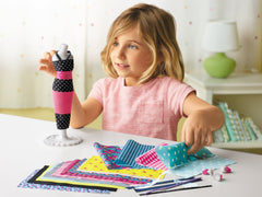 Lakeshore My First Fashion Designer fabric sheets enable quick styling.