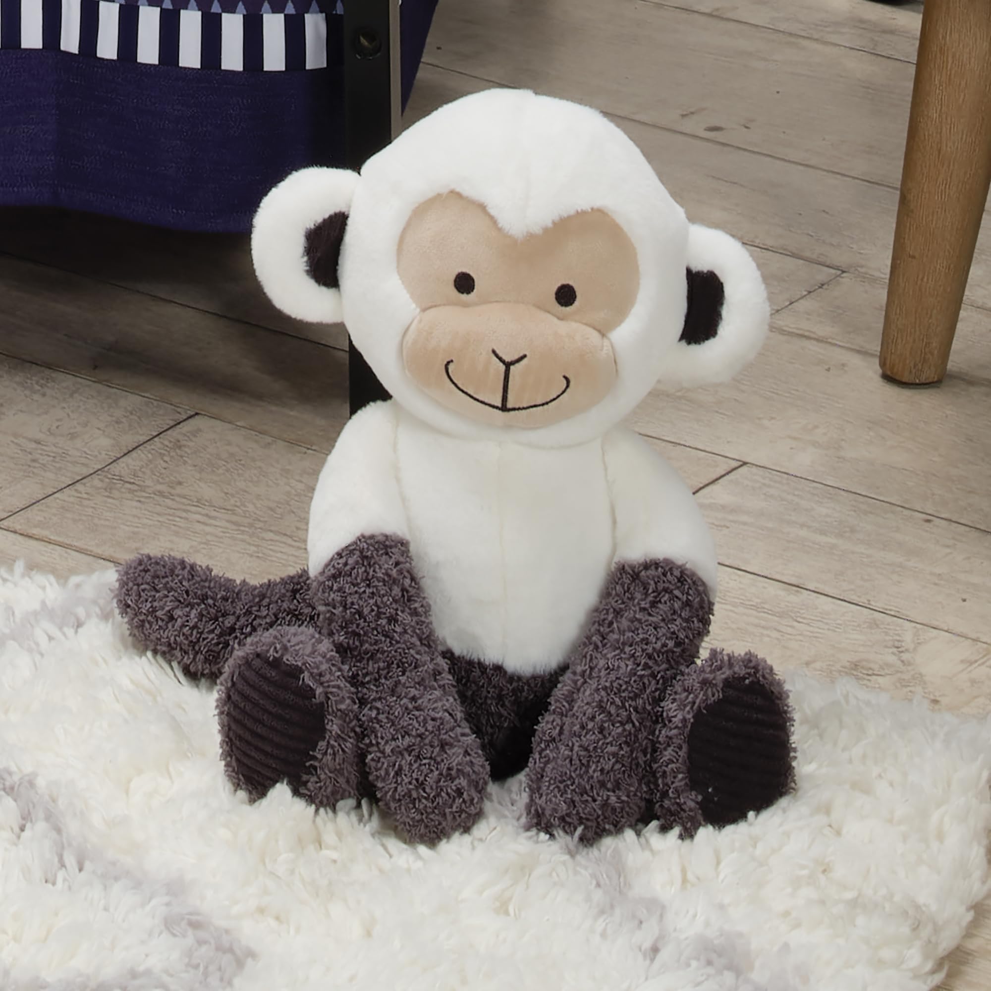 Lambs & Ivy Charlie monkey 14-inch size is ideal for crib or stroller use.