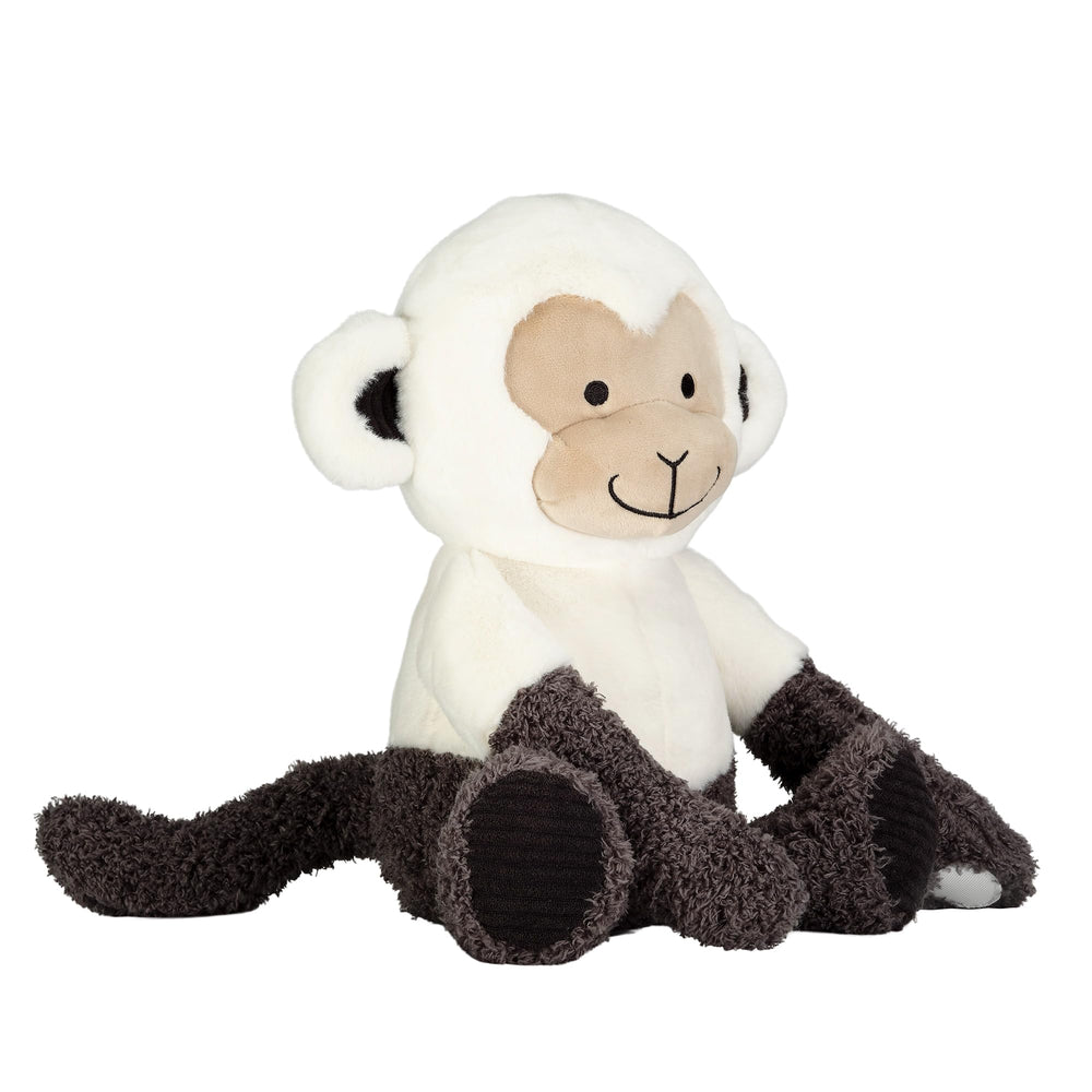 Lambs & Ivy Charlie monkey soft creamy minky fur texture invites gentle hugs.