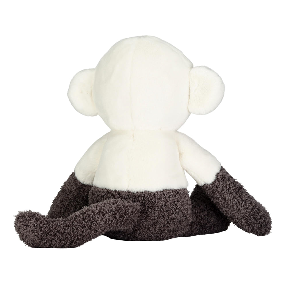 Lambs & Ivy Charlie monkey taupe face provides friendly expression.