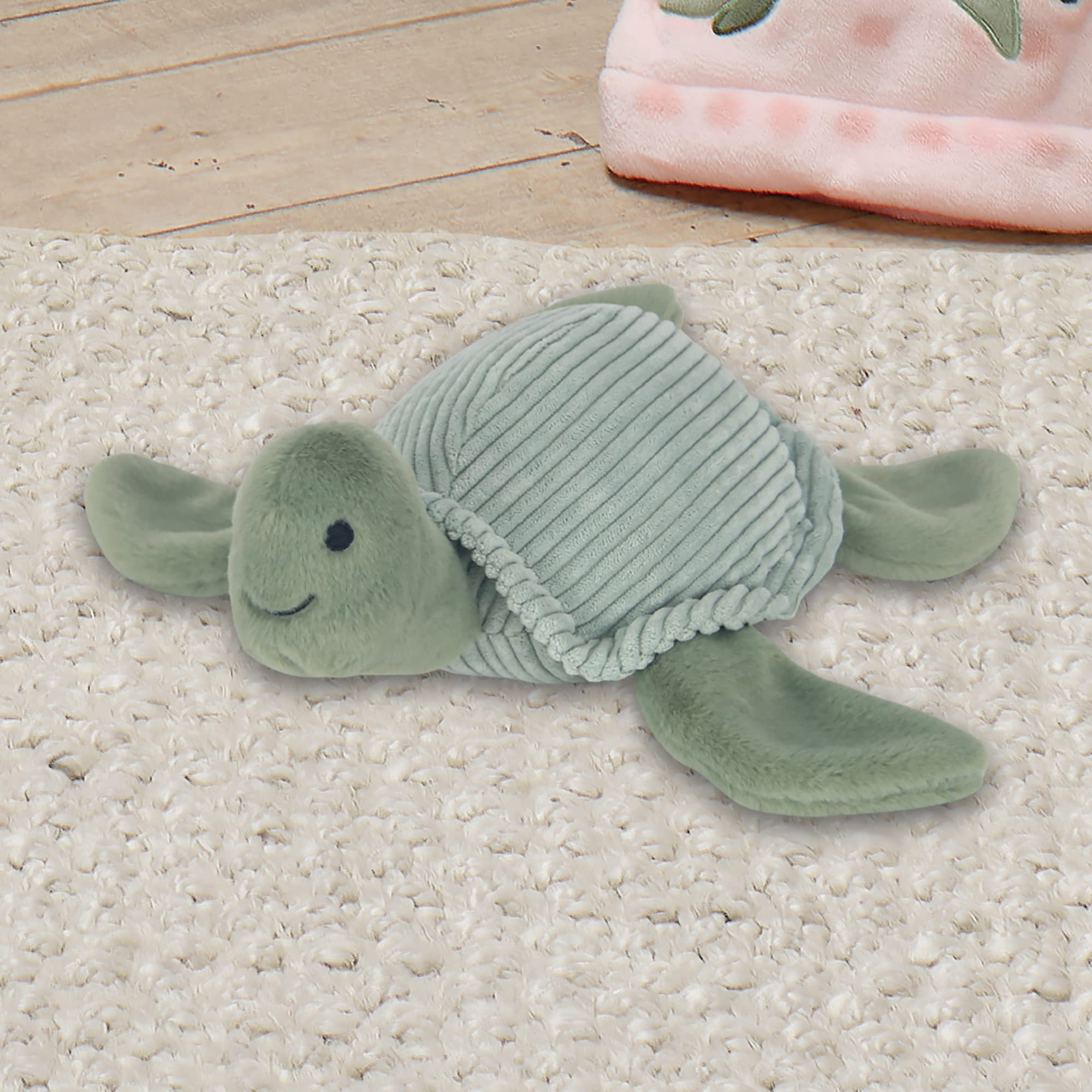 Shelly turtle plush features an embroidered baby friendly face