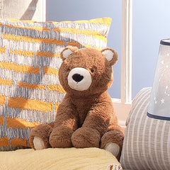 Lambs & Ivy Sierra Sky Brown plush bear sits softly on a shelf