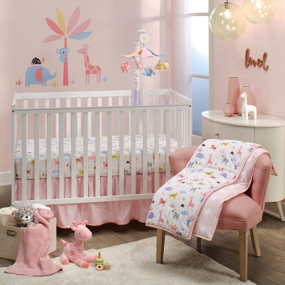 Lambs &amp; Ivy Snuggle Jungle pink giraffe plush complements nursery decor.