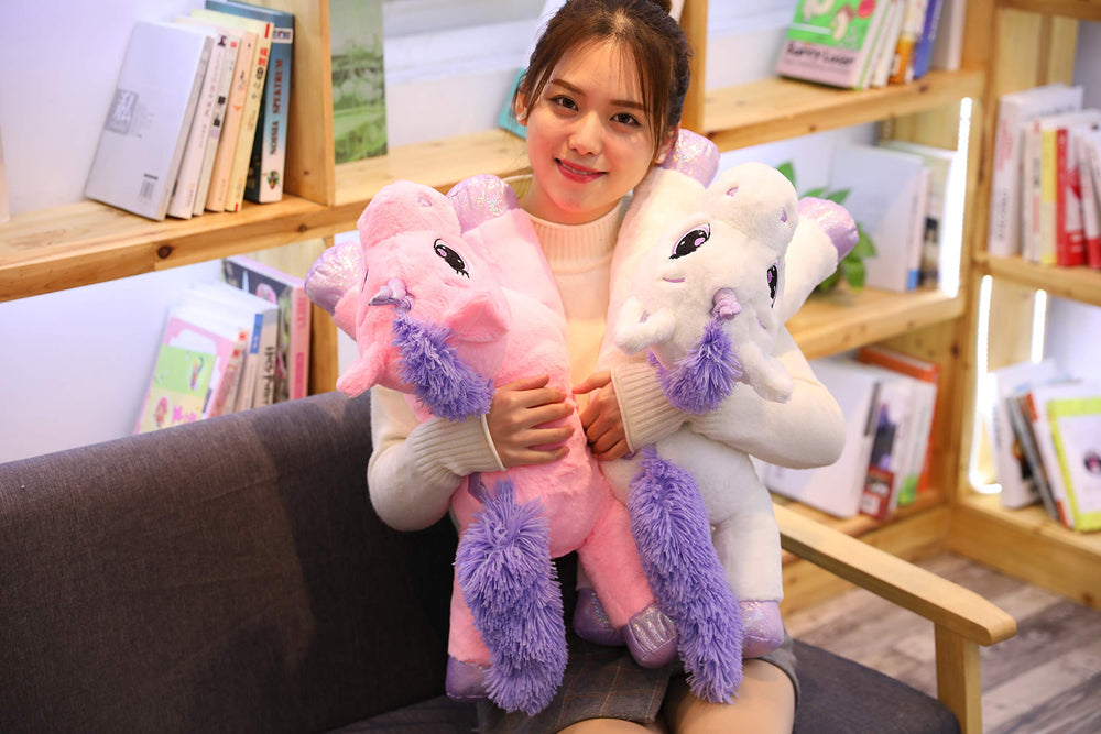 Lanmore 43-inch giant unicorn plush in a child-friendly room.