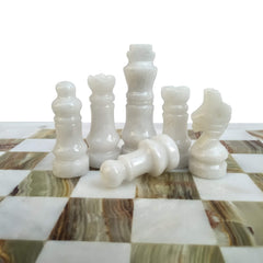 LAVISH CHESS SETS green onyx figures provide classic contrast on white squares.