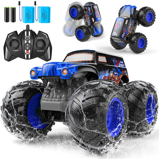 LAZZAROU 1:14 waterproof RC truck performs a front wheelie on a sandy beach for outdoor fun.