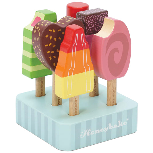 Le Toy Van Honeybake ice lollies set in bright colors for imaginative pretend play.