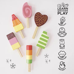Le Toy Van Honeybake six-piece ice lollies arranged on wooden sticks.