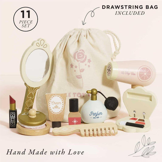 Le Toy Van Star Beauty Bag perfume bottle highlights pretend grooming and social storytelling.