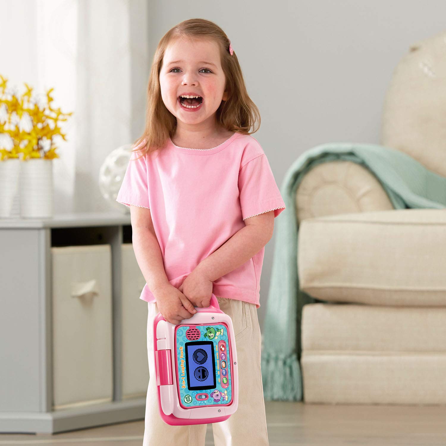 LeapFrog LeapTop Touch pink demo batteries shown; replace for regular use.