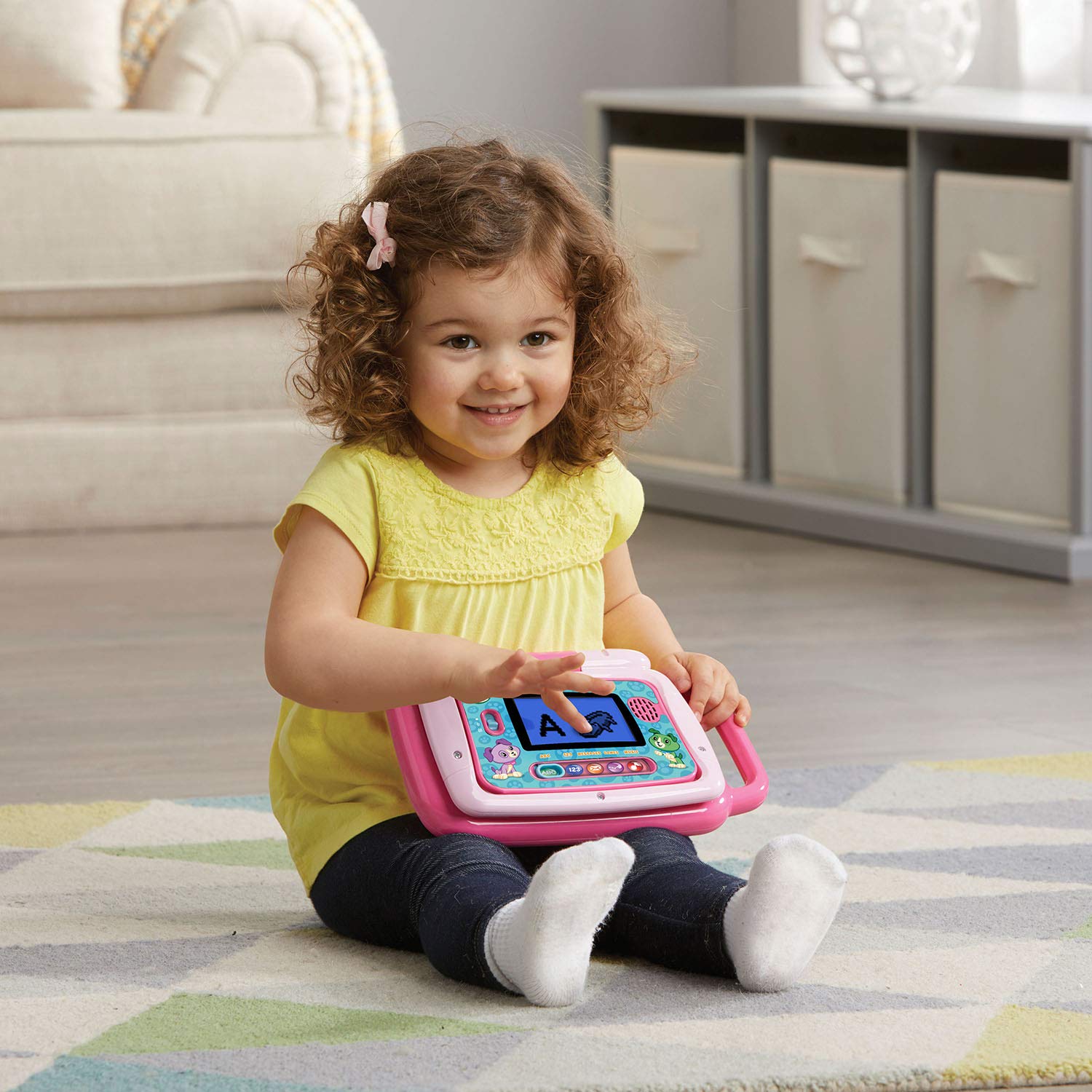 LeapFrog LeapTop Touch pink portable handle supports learning on the move.