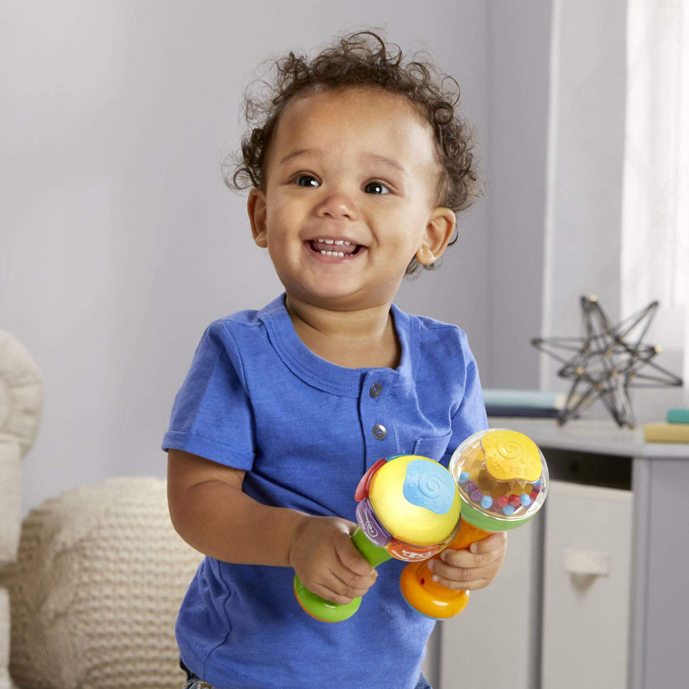 Ages 6+ months suitability and easy grip on LeapFrog maracas for early exploration.