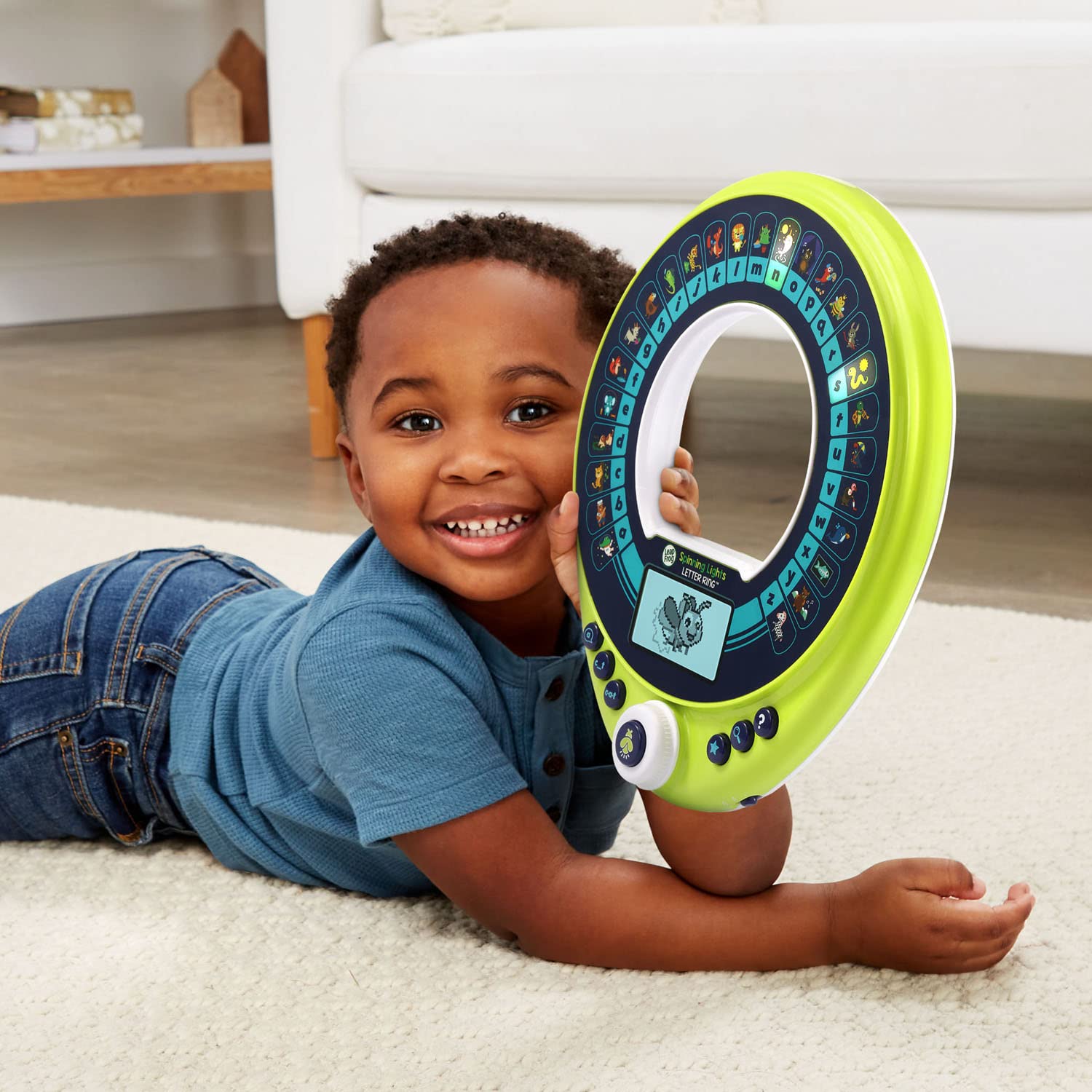 LeapFrog Spinning Lights Letter Ring uses 2 AA batteries with demo included.