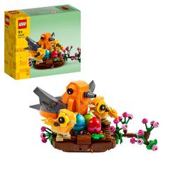 LEGO Bird’s Nest kit with branch and flowers for spring display on a table.