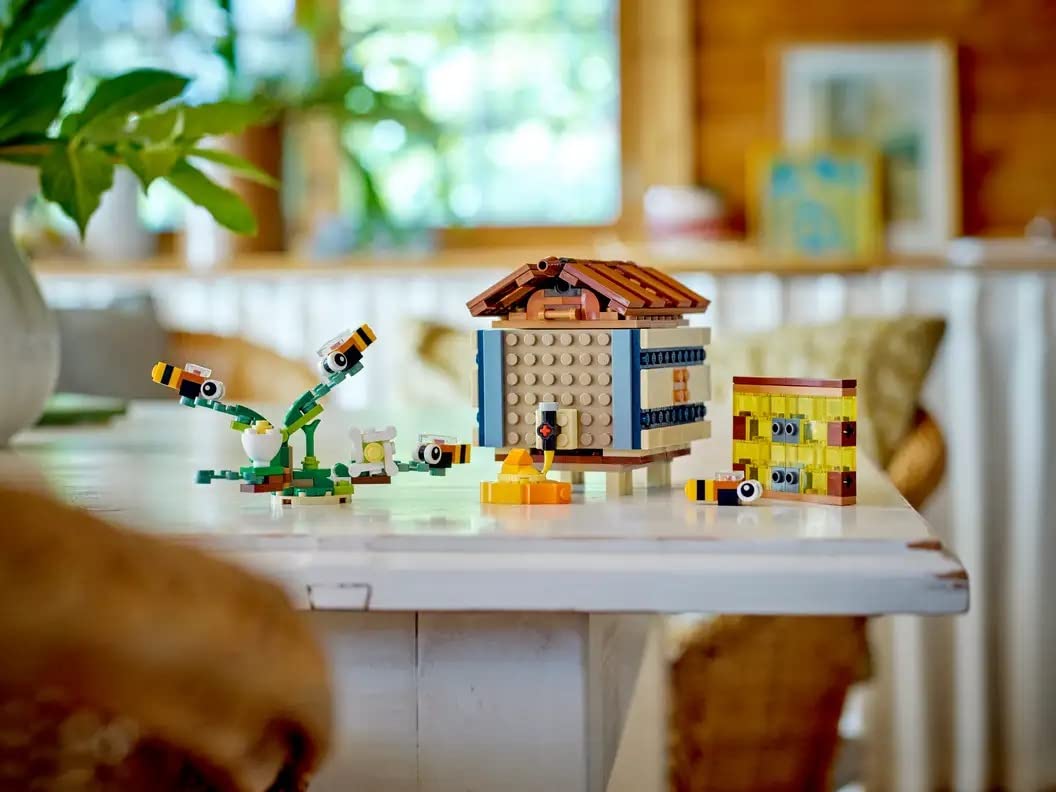 LEGO beehive with bees and honeycomb adds nature-inspired play.
