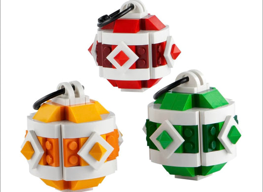 LEGO Christmas Ornament Set topper in blue-gold hues enhances display and family crafting moments.
