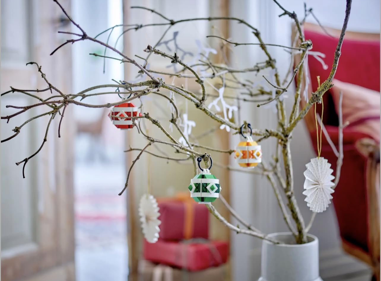 LEGO Christmas Ornament Set topper silhouette makes a memorable holiday shelf centerpiece.