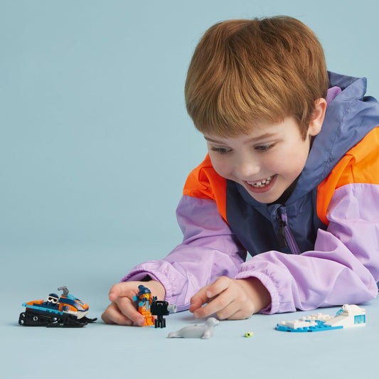 LEGO City Arctic Explorer minifigure joins the snowmobile for action-packed storytelling.