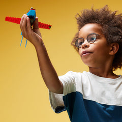 LEGO stunt plane cockpit open for easy pilot seating and action-packed role play.