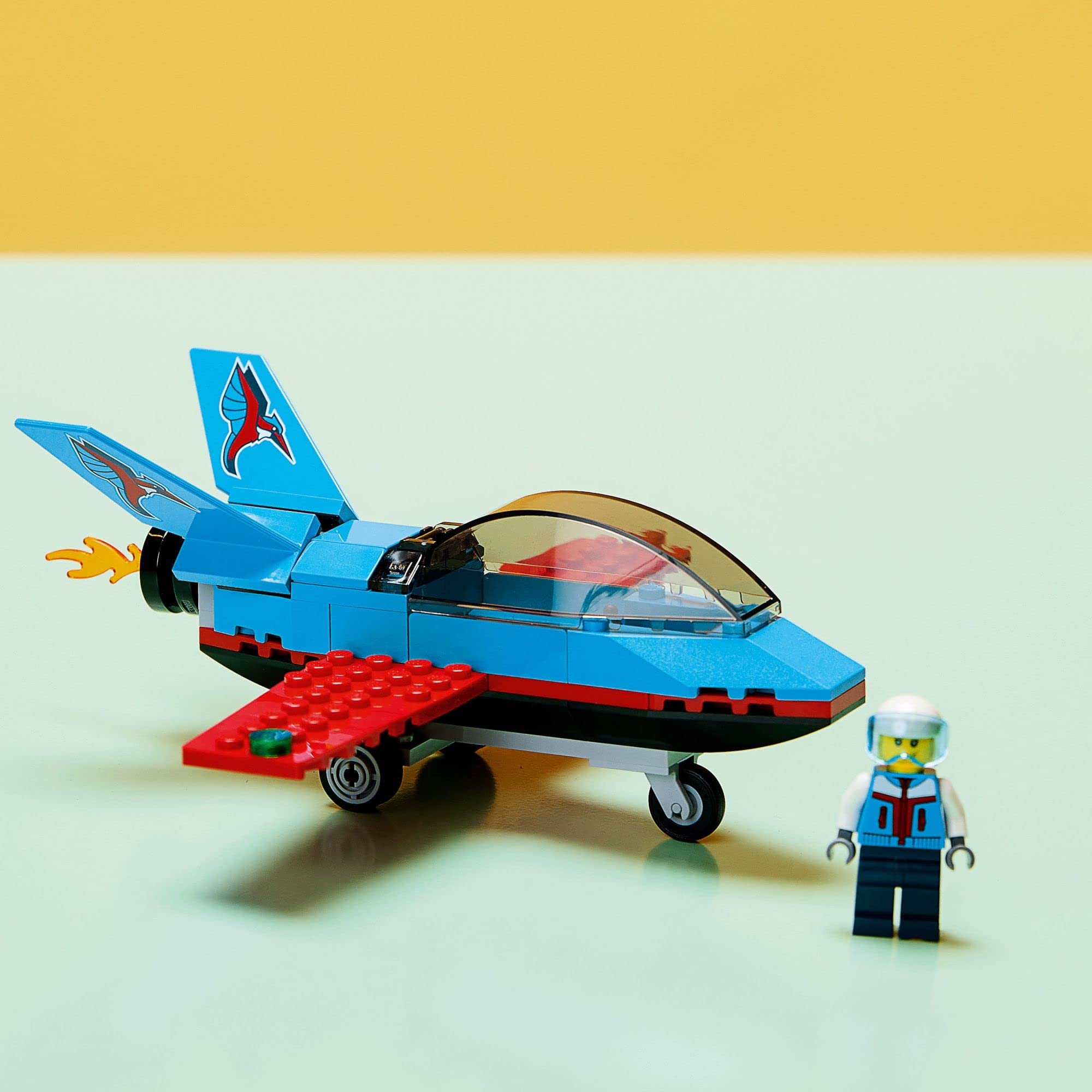 LEGO stunt plane with landing wheels ready for takeoff and stunts.