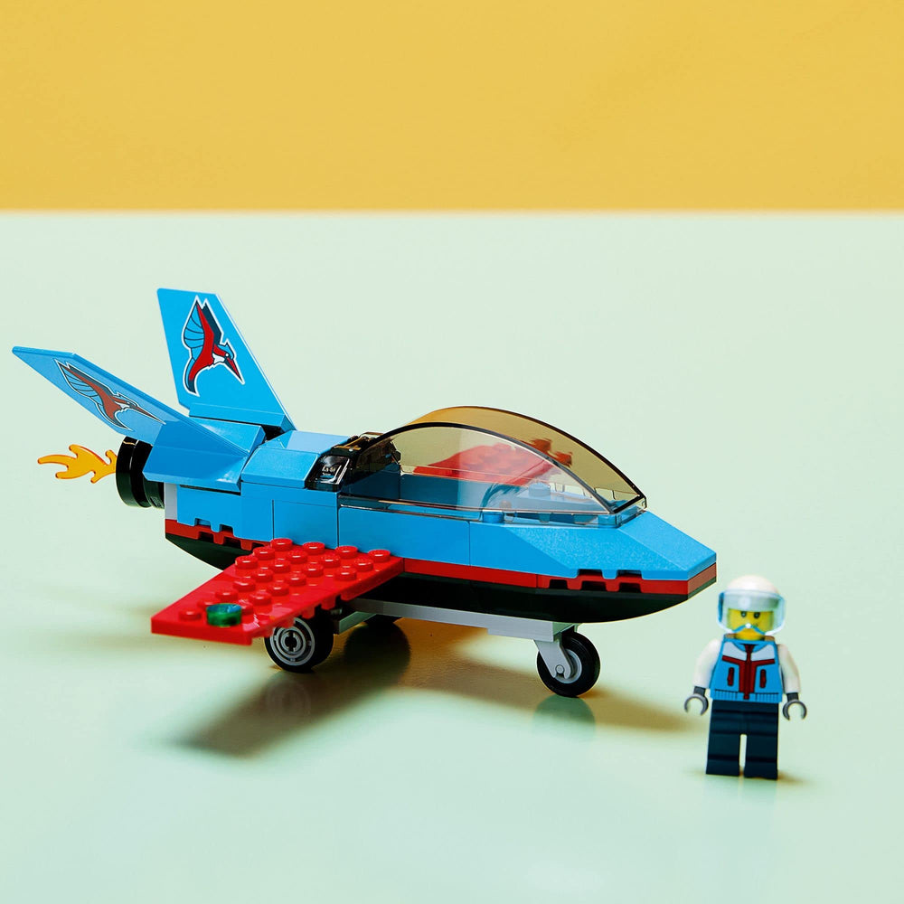 LEGO stunt plane with landing wheels ready for takeoff and stunts.