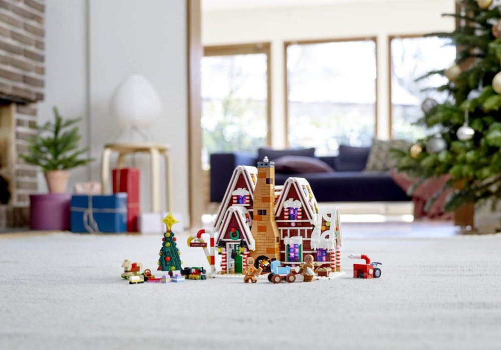 LEGO Gingerbread House figures with rocking horse and toy train invite imaginative play.