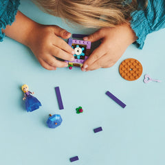 Rotating stand and key invite coordinated, rhythmic building and play.