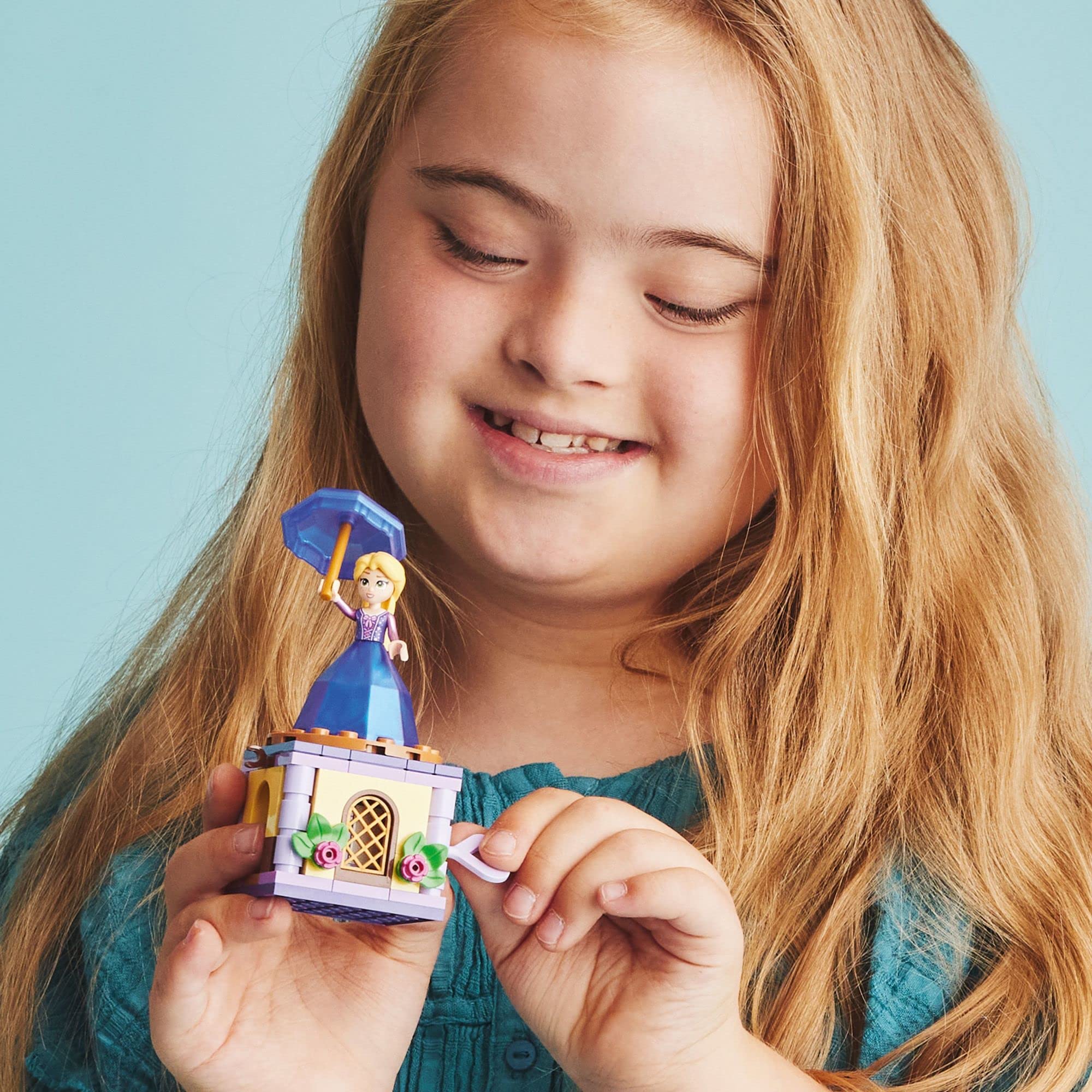 Rapunzel umbrella accessory enables storage between adventures for the mini-doll.