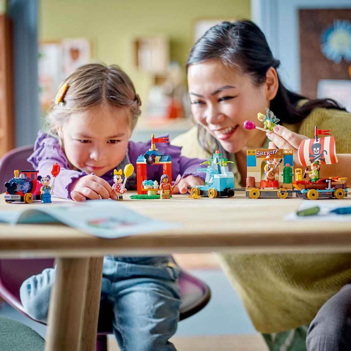 LEGO Disney train accessories guitar and balloons for festive play moments.