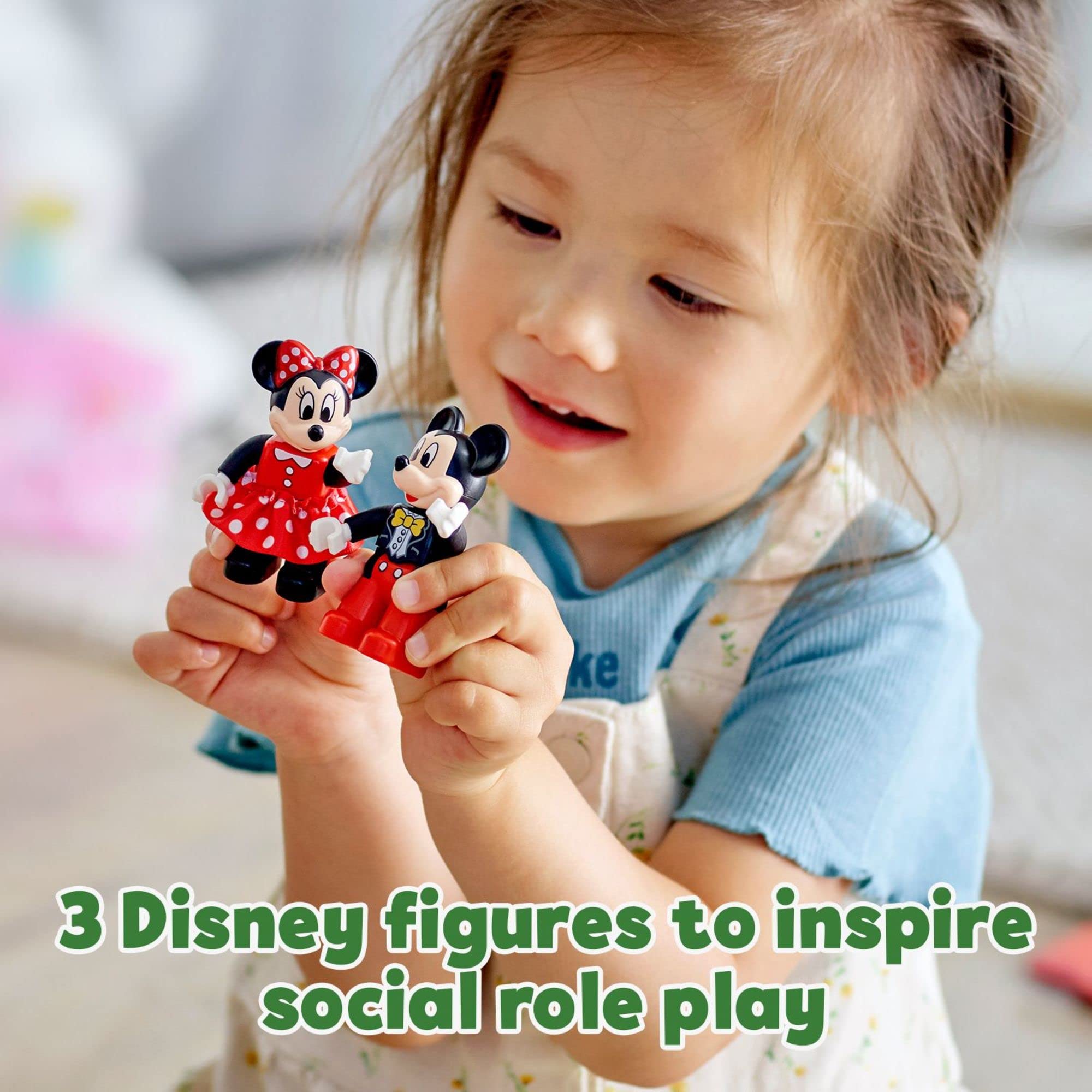 Minnie wears a fabric dress for imaginative dress-up moments.