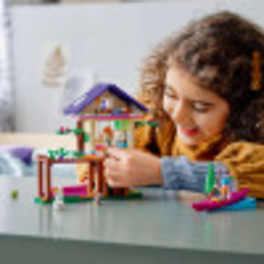 LEGO Friends Forest House interior bedroom scene for cozy pretend living.