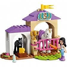 LEGO Friends stable with hay bale and pitchfork encourages caretaking and tidy spaces.