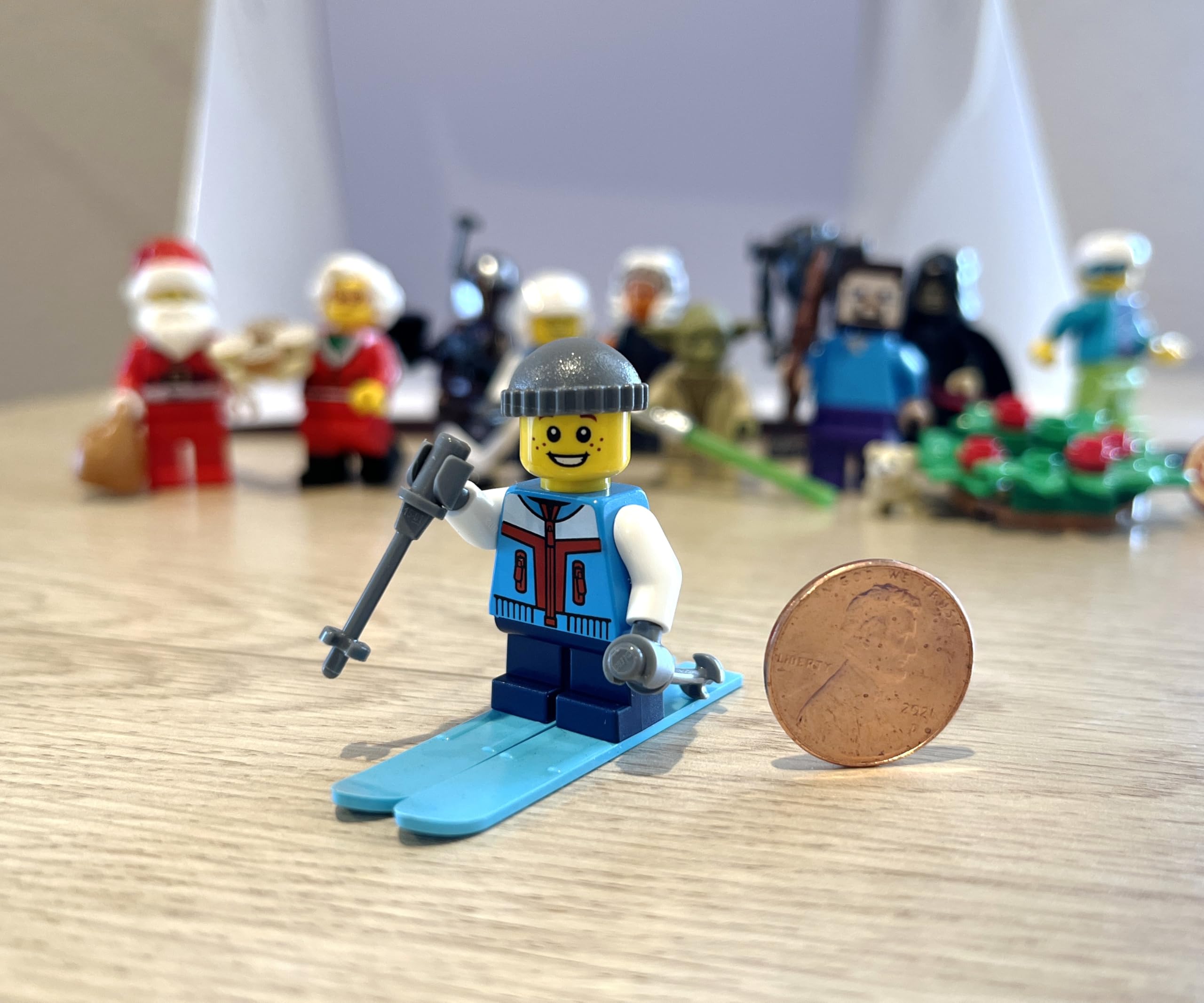 LEGO Holiday minifigure Skier Boy skies and poles in action pose for storytelling.