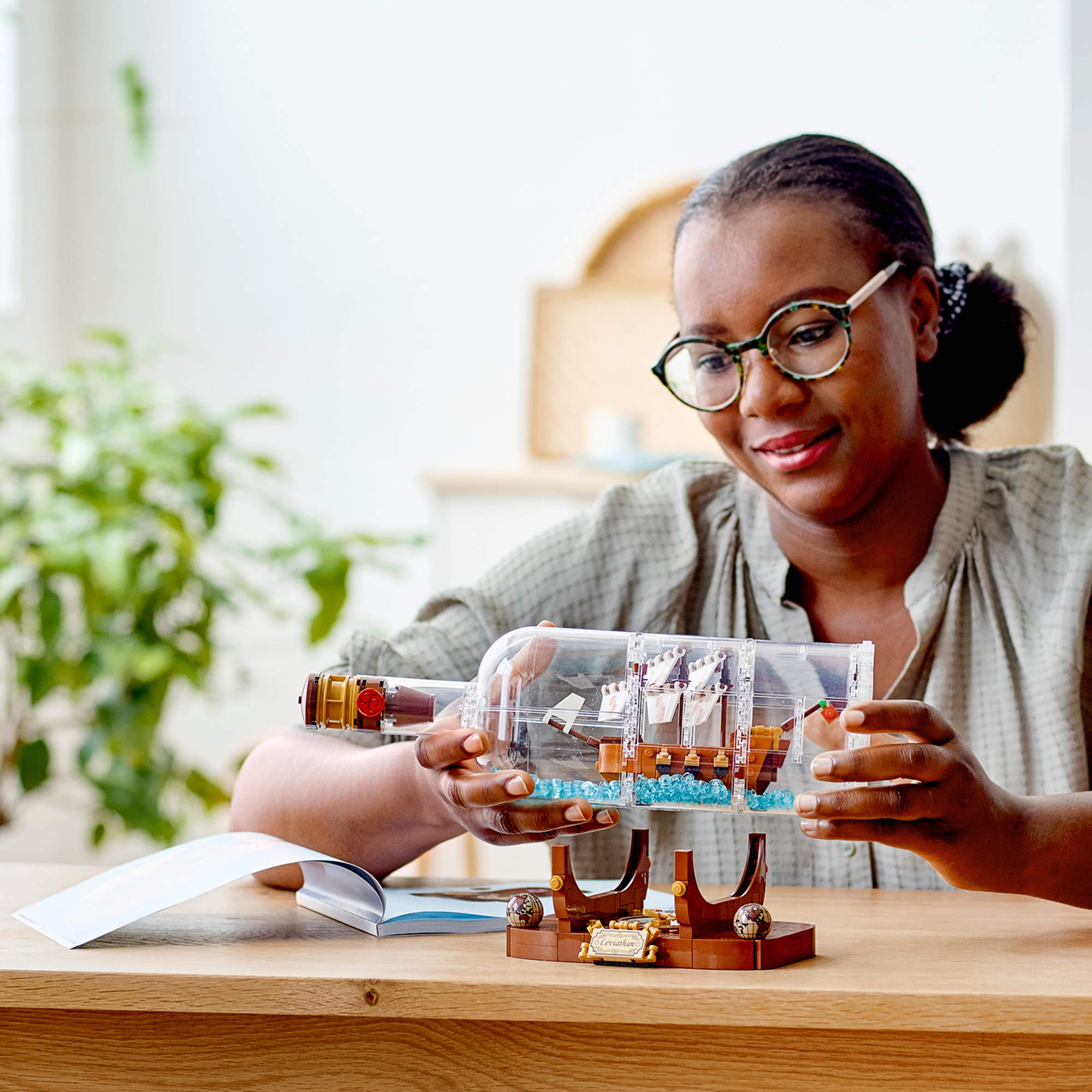 LEGO Ideas Ship in a Bottle cannons and mast close-up for dramatic display.