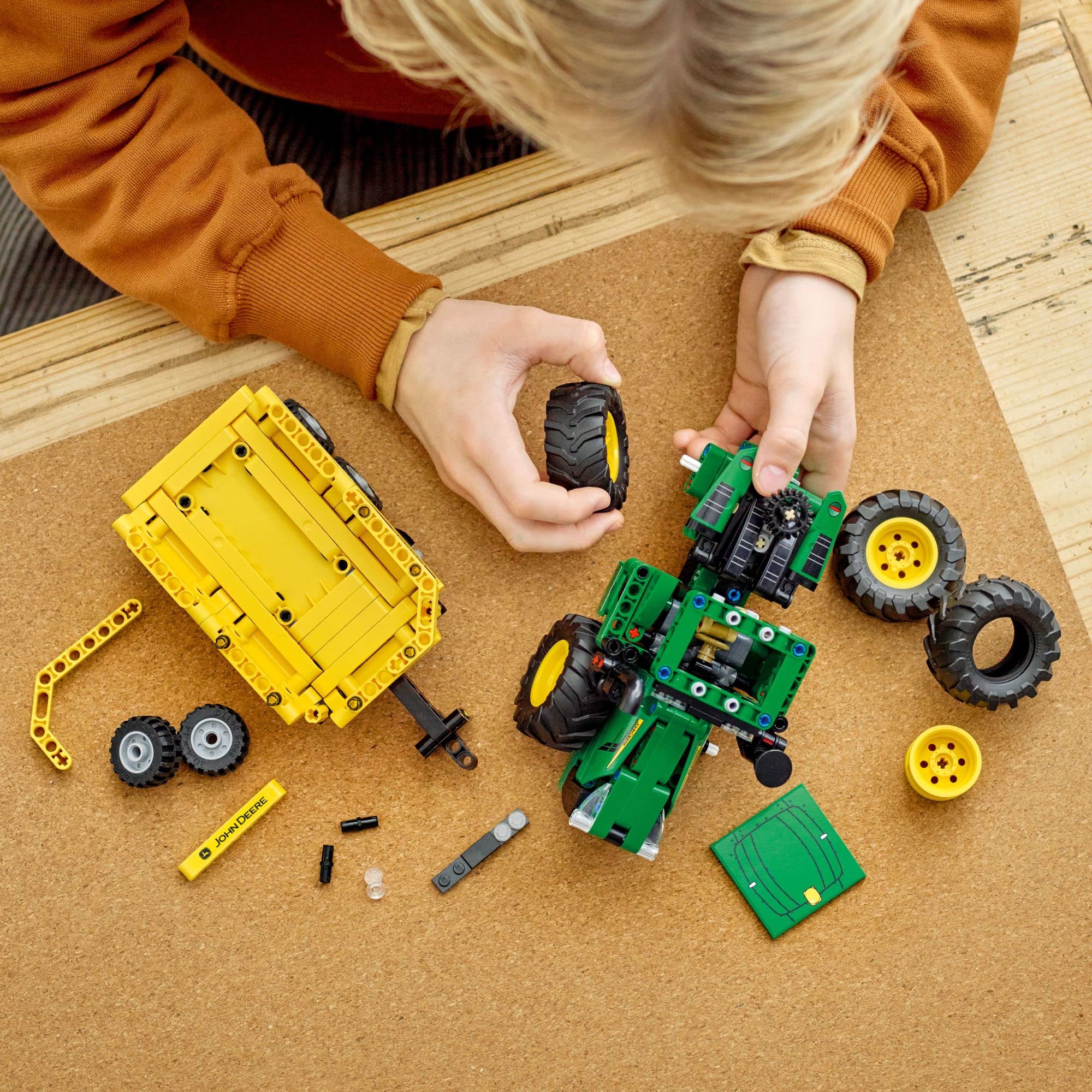 LEGO John Deere 9620R tractor 4WD wheels enable realistic terrain play.