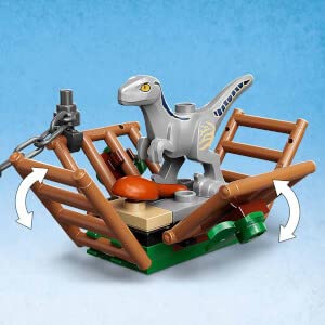 Folding dinosaur cage for dramatic reveals