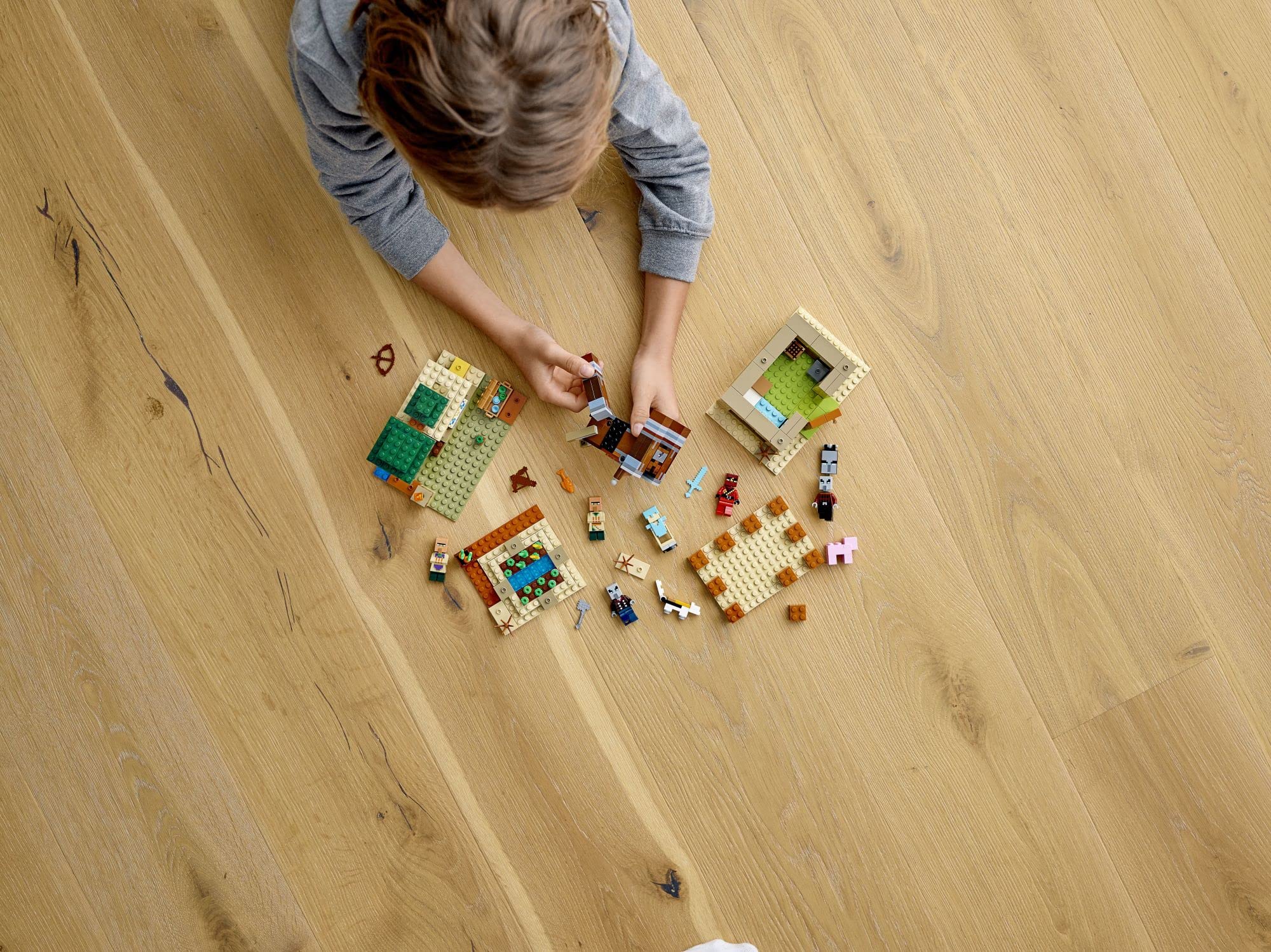 LEGO Minecraft Kai figure leads villager rescue and defense scenes.
