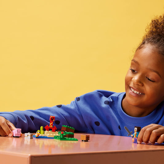 LEGO Minecraft The Creeper Ambush—baby pig minifigure for animal care stories.