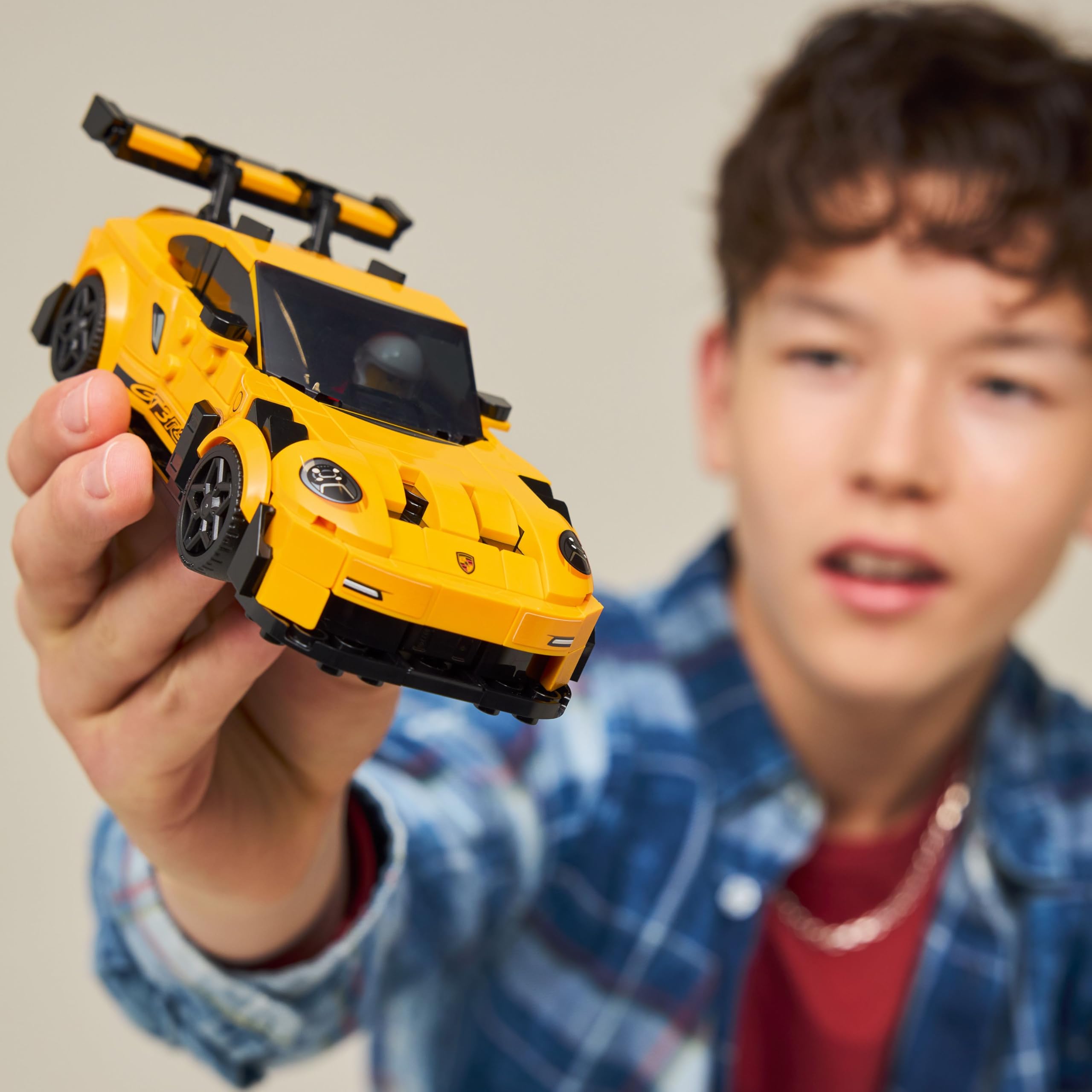 LEGO Speed Champions Porsche 911 GT3 RS detailed-parts view showing rims and hood intakes