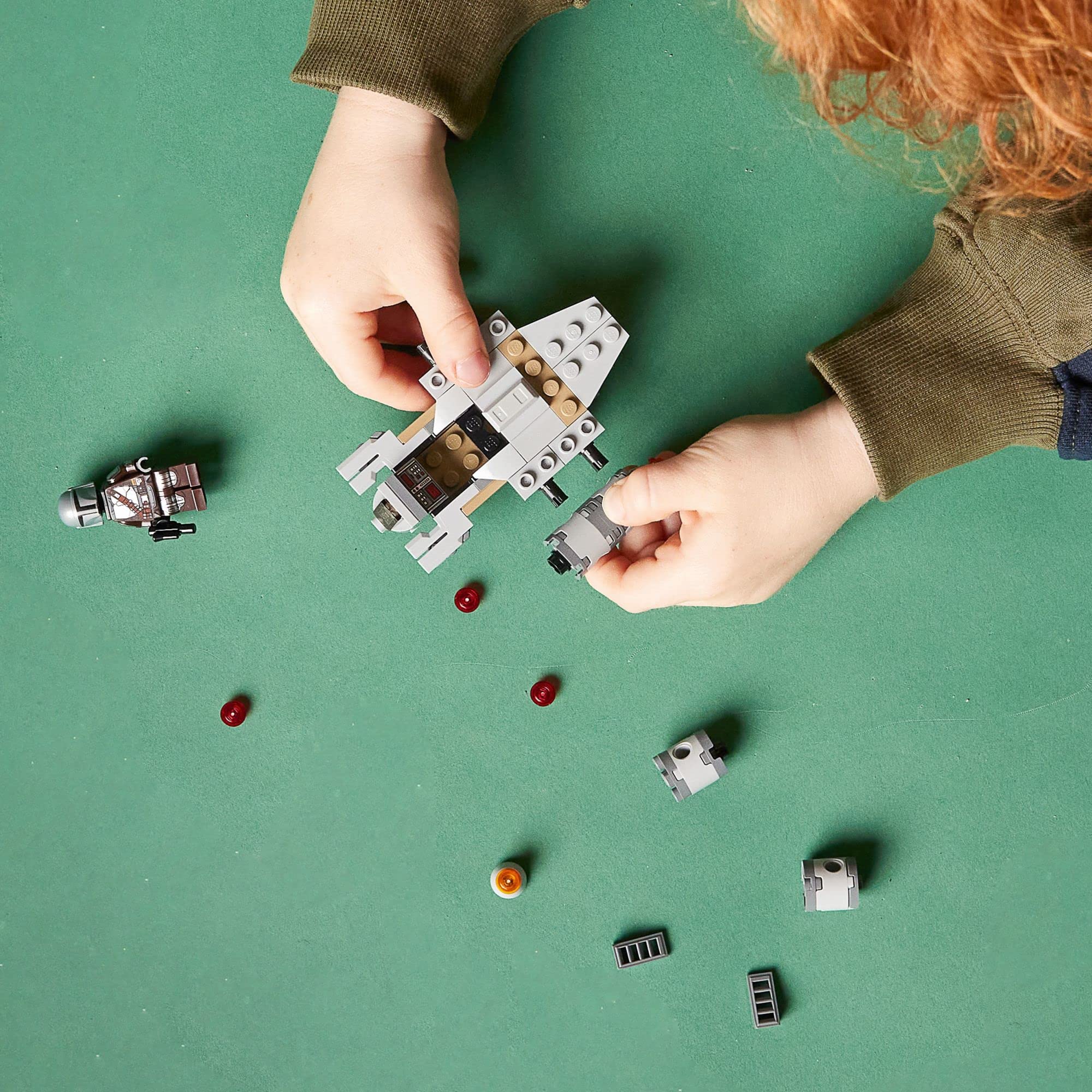 LEGO Star Wars Razor Crest Microfighter shown with buildable jetpack and blaster